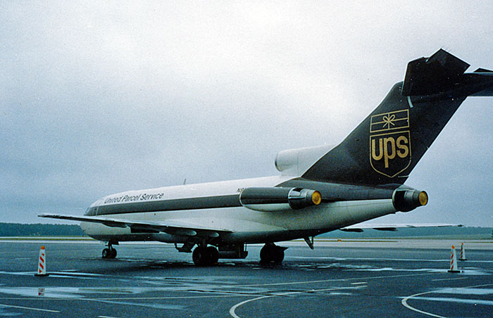 Unusual to see in daylight! A UPS B727-100 on the ramp in 1985
